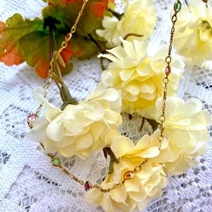 PREOWNED TIN CUP STYLE NECKLACE. GOLD TONE CHAIN WITH BEAUTIFUL GEMSTONE COLORS